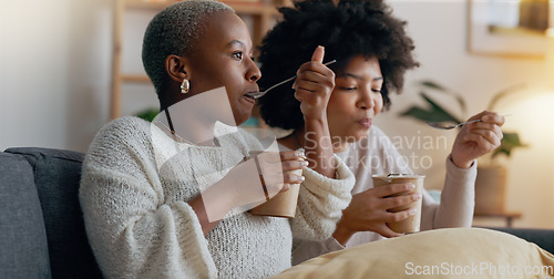 Image of Relax, ice cream and women friends eating together on the weekend to bond with frozen dairy treats. Black people in girl friendship enjoy sweet dessert break to relax while resting in home.