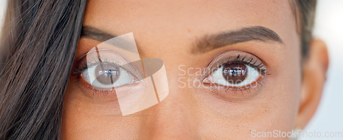 Image of Confident, happy and beautiful woman face, looking excited and free, proud female cheerful about beauty procedure. Closeup portrait of female smiling after getting natural looking eyelash extensions