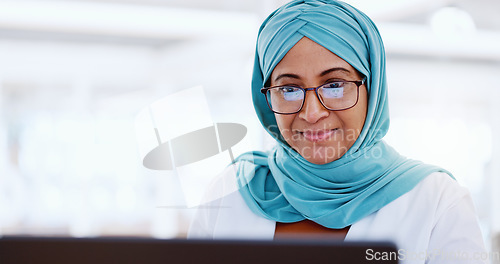 Image of Muslim business woman, face and working at laptop, email and communication with focus and technology. Worker in hijab, corporate goals with internet, networking and research online for project