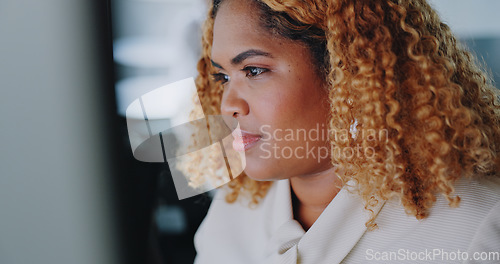 Image of Business, black woman and focus on typing, computer and online schedule in modern office. African American female, administrator and employee with concentration, corporate planning and professional