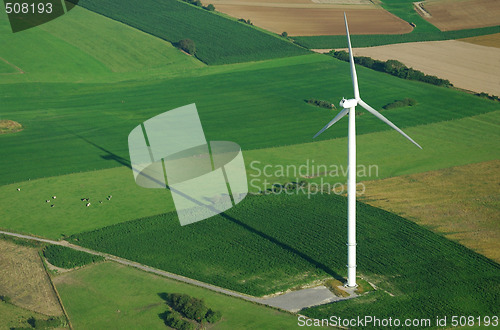 Image of aerial view of windturbine and shadow