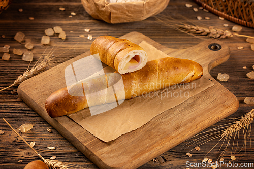 Image of Bun with ham and cheese