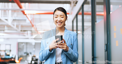 Image of Asian woman, modern office and smartphone for connectivity, social media and fintech. Female entrepreneur, employee or lady with phone, communication and search internet with smile and online texting