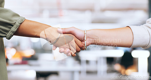 Image of Corporate handshake, closeup and office for woman in agreement, deal or welcome to team in finance startup. Shaking hands, women and thank you for success, contract or partnership for investment goal