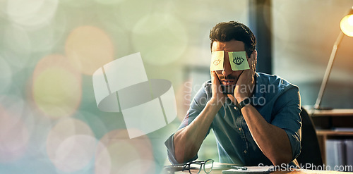 Image of Tired, sleeping and man with sticky note on eyes for burnout, depression and low energy for career or business fatigue. Sleep, mental health and employee, worker or professional person nap at desk