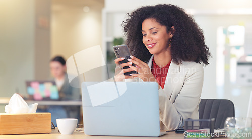 Image of Real estate agent typing on laptop, thinking of creative property marketing advertisement to post on social media to sell a property. Confident, ambitious realtor with afro negotiating deal via email