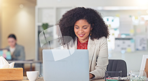 Image of Real estate agent typing on laptop, thinking of creative property marketing advertisement to post on social media to sell a property. Confident, ambitious realtor with afro negotiating deal via email