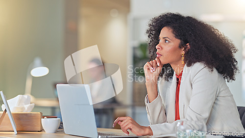 Image of Real estate agent typing on laptop, thinking of creative property marketing advertisement to post on social media to sell a new house. Confident, ambitious realtor with afro negotiating deal on email