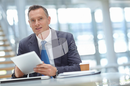 Image of Portrait, corporate or business man with tablet in office for motivation, company research or website review. Manager, accountant or employee with tech for social network, internet or mobile app