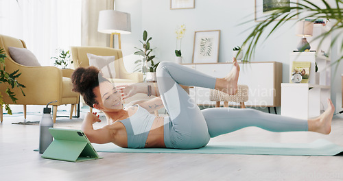 Image of Woman, tablet and yoga live streaming class for relax workout, exercise and training in house living room, home lockdown and quarantine. Zen, stretching and wellness yogi with technology for pilates