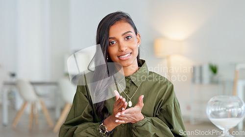 Image of Business woman talking on video call, meeting and seminar while sitting in an office at work. Portrait of one corporate professional making conversation in an online, remote and virtual conference