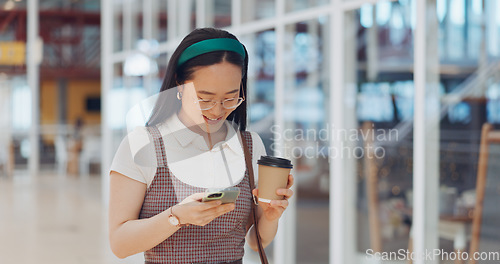 Image of Phone, mall and Asian woman typing, social media or messaging. Technology, coffee and happy female with mobile smartphone for networking, internet browsing or web scrolling alone at shopping mall.