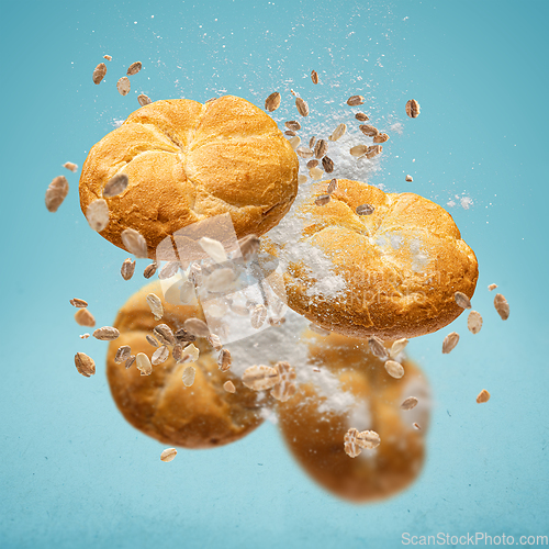 Image of Delicious buns flying in air