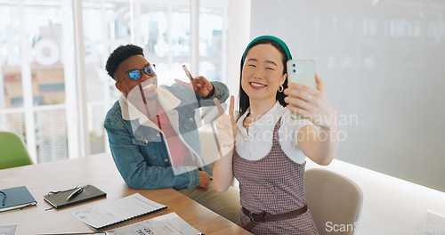 Image of Smile, friends and selfie with business people and phone with thumbs up, peace sign or wave on break. Diversity, social media and internet with black man and asian woman for teamwork, relax or mobile