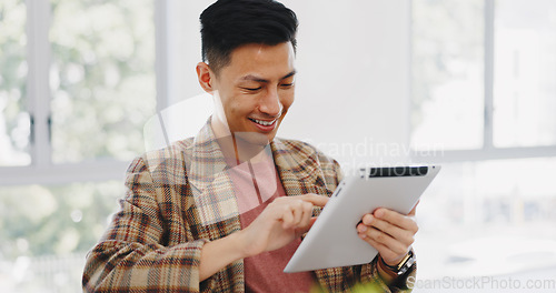 Image of Tablet, research and creative with an asian man designer thinking about an idea while working on a design. Internet, innovation and search with a male employee at work in his marketing office