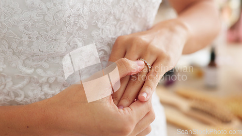 Image of Nervous, anxiety and scared bride on wedding looking at her ring in a room. Thoughtful young woman thinking about future, life and marriage partner with fear, mistake and worry about being a wife