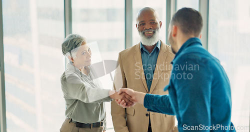 Image of Handshake, welcome and thank you with business people in office after interview with manager. Shaking hands, diversity and b2b partnership, collaboration or happy business deal, success and teamwork