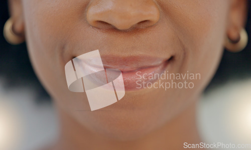 Image of Closeup of smiling Headshot of a happy woman promoting healthy oral and tooth care routine
