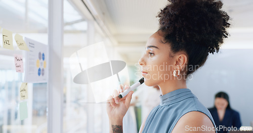 Image of Sticky note, notebook and teamwork of business people in office workplace. Planning, collaboration and women with book brainstorming sales, advertising or marketing strategy and writing on glass wall