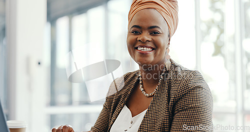 Image of Portrait, face or black woman in office building with a happy smile working on email marketing online at desk. Human resources, startup or African worker in with motivation, goals or success mindset