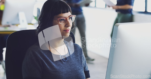 Image of Business woman, computer and online planning at desk, table and internet research in office. Female designer, desktop and technology strategy for seo website, data review or creative innovation ideas