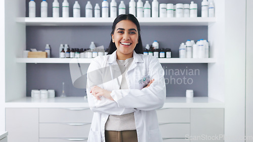 Image of Portrait of a female scientist using a microscope in a research lab. Young biologist or biotechnology researcher working and analyzing microscopic samples with the latest laboratory tech equipment