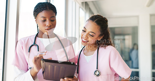 Image of Healthcare, tablet and nurses talking and planning schedule for medical team while online with hospital wifi. Women nursing staff meeting using technology for training, innovation and medicine