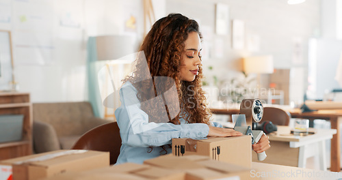 Image of Delivery boxes, black woman shipping package or ecommerce sale with supply chain, logistics or courier product in retail shop. Woman, retail sales worker or design store manager for commercial export