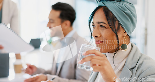 Image of Business woman, drinking water and smile on face while in a corporate meeting for planning a collaboration with a team. Female entrepreneur happy and thinking about idea while at workshop or training