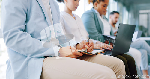 Image of Recruitment, row and business people writing in notebook for hiring, job interview or work opportunity. Human resources, onboarding and candidates sitting with book, typing on laptop and write notes