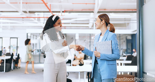 Image of Business women, hand shake and high five for success celebration in office. Sequence, group teamwork or partnership of female friends or employees walking, talking and shaking hands for collaboration