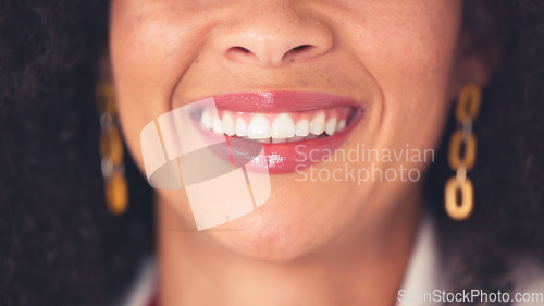 Image of Oral hygiene closeup of a woman smiling and showing her perfect white teeth. Confident young black woman with a flawless and beautiful smile. Visit your dentist regularly for dental cleaning