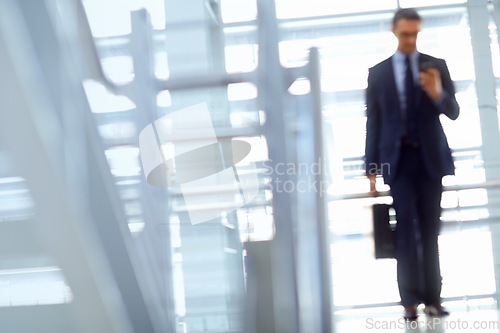 Image of Blurred, travel or business man with phone for invest strategy, finance growth or financial review. CEO, airport or manager with smartphone for planning, data analysis or economy data web research