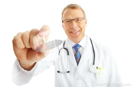 Image of Face, doctor and man with pills in studio isolated on a white background. Portrait, healthcare and happy medical worker, pharmacist and mature male holding drug medicine, medication or capsule remedy