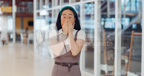 Image of Wow, surprise and excited with a business asian woman looking shocked by putting her hands on her face in expression. Portrait, emoji or motivation with a female employee feeling shock frim good news