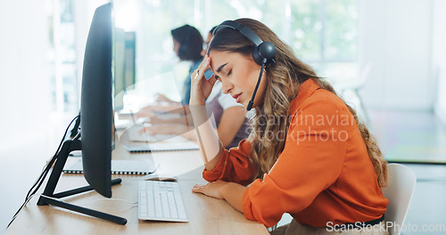 Image of Stress, headache and burnout woman at call center, feeling tired or exhausted. Mental health, anxiety or female sales agent, consultant or telemarketing employee with depression or migraine in office