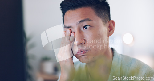 Image of Asian businessman, tired and hand on face in communication office, headache and marketing company. Man, computer or late night reading with burnout, target or kpi at digital marketing agency in Tokyo