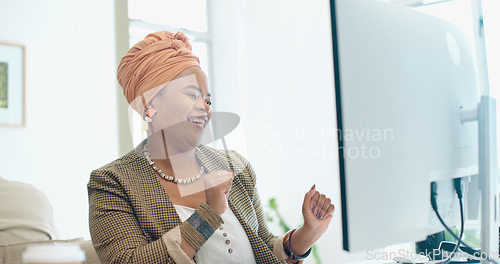 Image of Black woman, computer and fist celebration in office for success, promotion or winning at desk. Corporate African executive smile, winner celebrate and pc for email, motivation or performance bonus