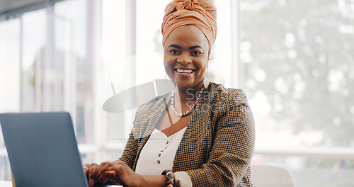 Image of Portrait, face or black woman in office building with a happy smile working on email marketing online at desk. Human resources, startup or African worker in with motivation, goals or success mindset