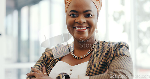 Image of Portrait, face or black woman in office building with a happy smile working on email marketing online at desk. Human resources, startup or African worker in with motivation, goals or success mindset