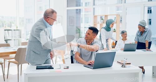 Image of Diversity, men fist bump and modern office for success, achievement and marketing strategy. Hand gesture, guys and employees happy, laptop for online schedule and business growth for sales and smile.