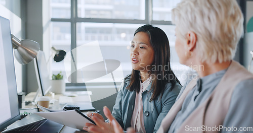 Image of Business, women and conversation in office, marketing planning and advertising campaign. Females, ceo and employees for sales growth, manager explain system and communication for process and speaking