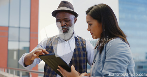 Image of Tablet, team work or ceo and employee on rooftop planning a SEO strategy for online content marketing in a digital agency. Leadership, senior black man or mentor talking or speaking of business goals