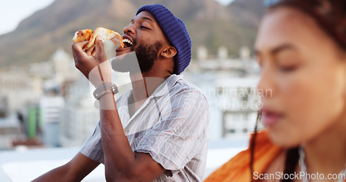 Image of Couple, eating pizza and bonding on city building rooftop in Miami, Florida while dancing, enjoying and relaxing. Smile, happy black man and woman with fast food in relax tourist location for summer