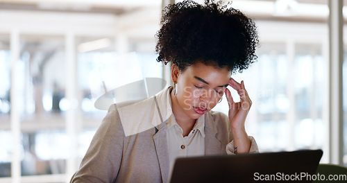 Image of Mental health, stress and black woman with headache in office on laptop working on report, project and deadline. Corporate burnout, migraine pain and female worker tired, frustrated and depressed