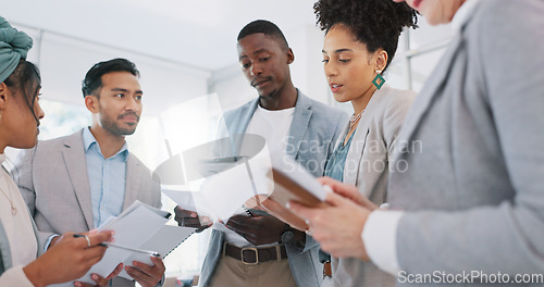 Image of Business people, communication and collaboration with corporate documents, diversity and discussion about marketing strategy. Folder, tablet and report with business data and planning team at office.