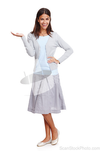 Image of Fashion, portrait and woman with product mockup in a studio for placement, marketing or advertising. Happy, smile and female model weighing mock up space with her hand isolated by a white background.