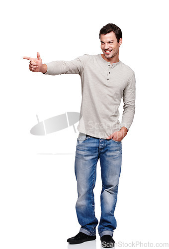 Image of Happy, idea and man pointing hand in direction with excited, curious and thinking expression. Happiness of model contemplating solution or choice with smile at isolated white background