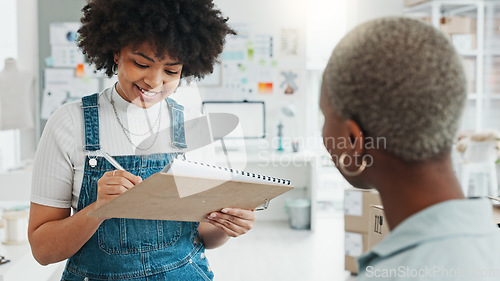 Image of Black woman, delivery and logistics, at work in office or studio in conversation on supply chain. Women, business and shipping of package of stock, product or order from courier sign paper for cargo