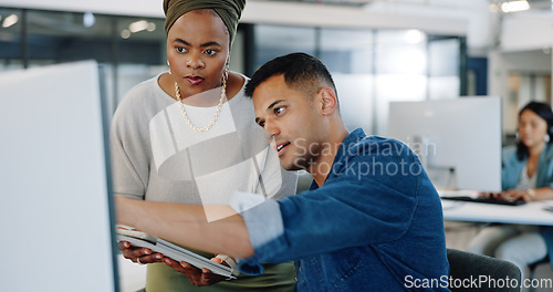 Image of Computer, tablet and collaboration with a business team working together on research or innovation. Idea, planning and discussion with a man and woman employee talking in their modern work office